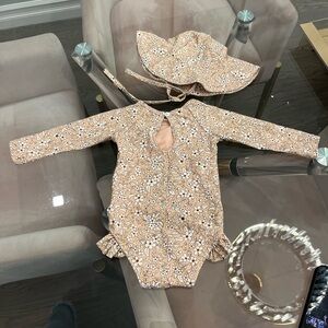 Quincy Mae swimsuit and matching hat size 3-6 months brand new condition!